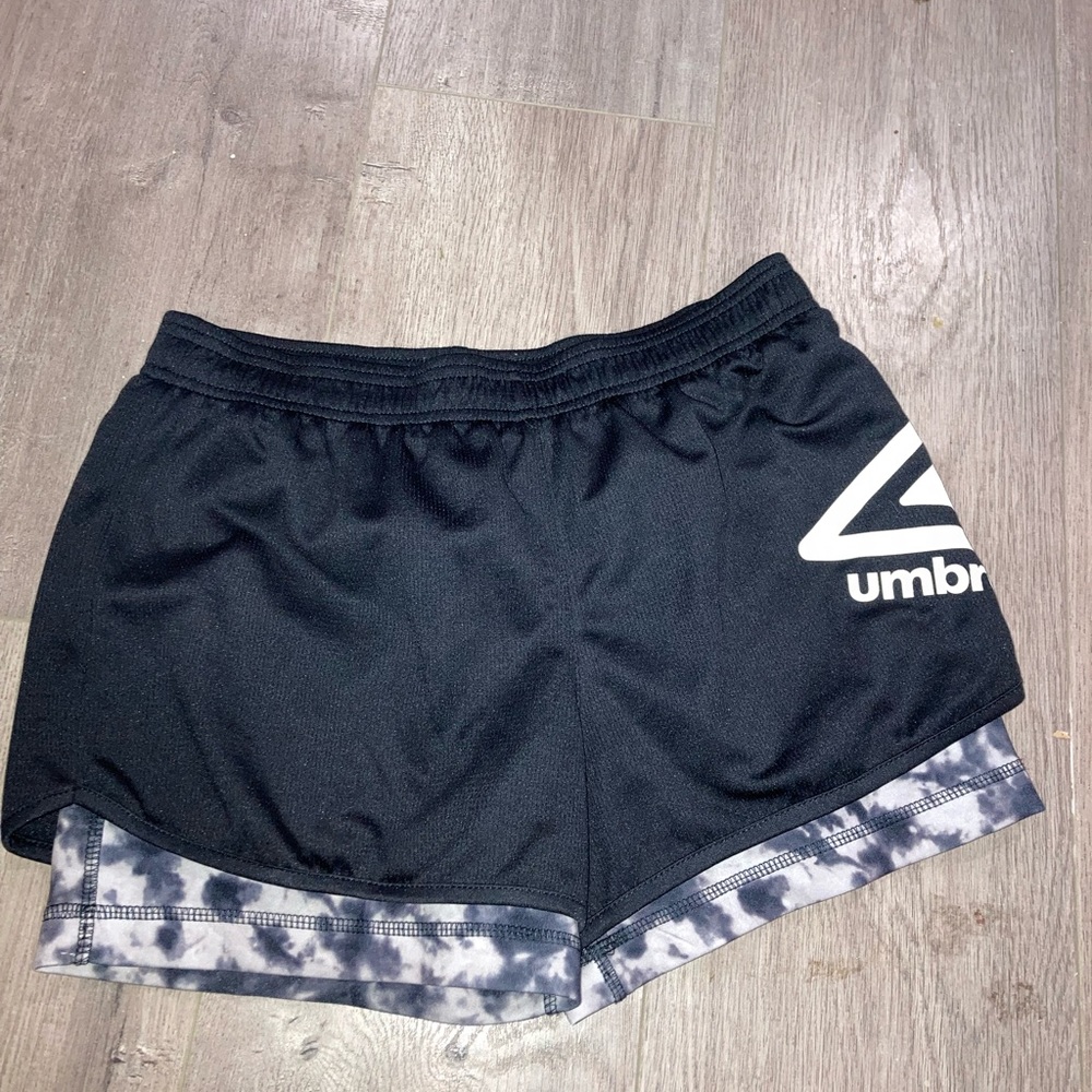 Umbro shorts with spandex built in underneath.  Size 14/16